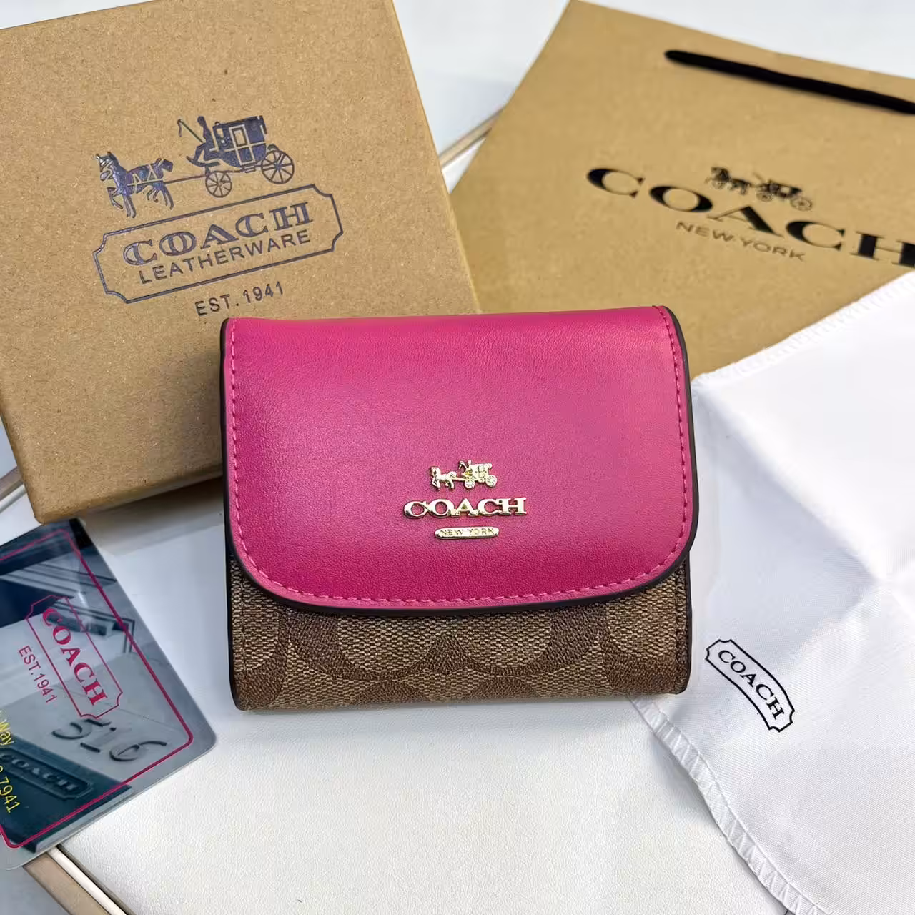 WhatsApp Image 2025-12-02 at 6.44.51 PM Coach three Fold Apricot Rose Pink Wallet