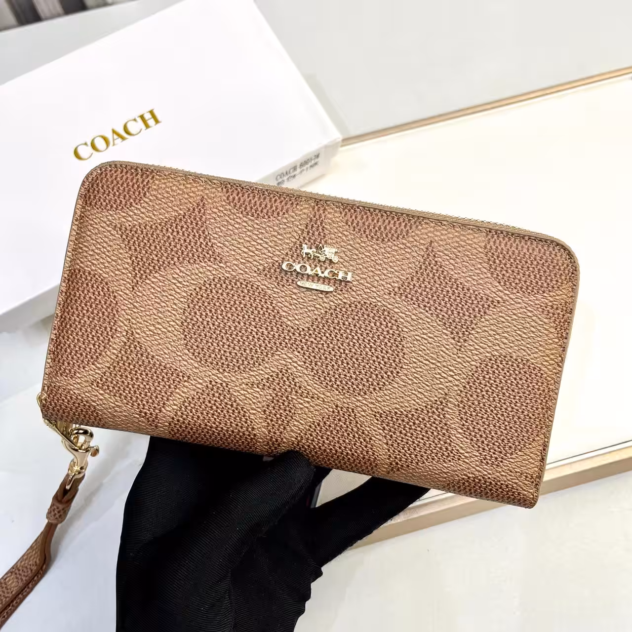 WhatsApp Image 2025-12-02 at 7.27.31 PM Coach Apricot Long Zipper Wallet