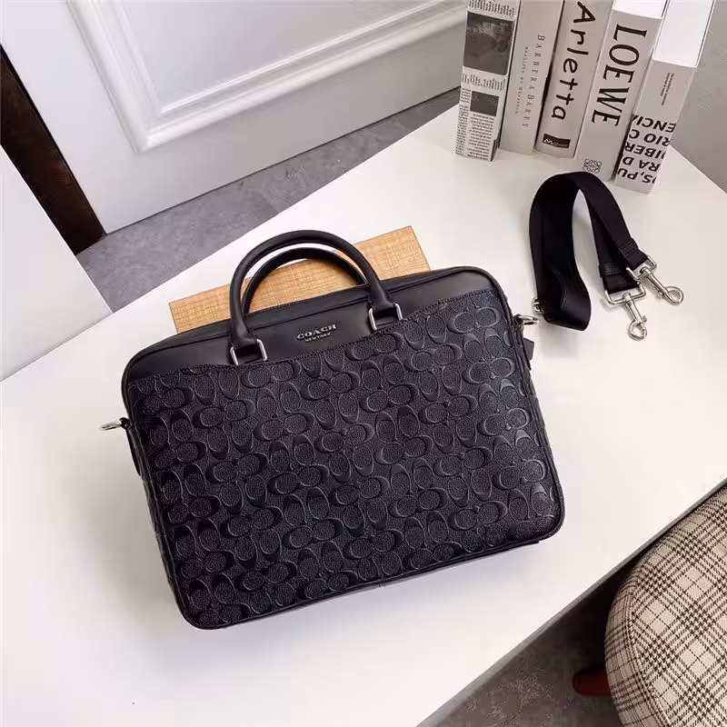 WhatsApp Image 2025-12-18 at 10.25.51 PM Coach Embossed Premium Laptop Bag