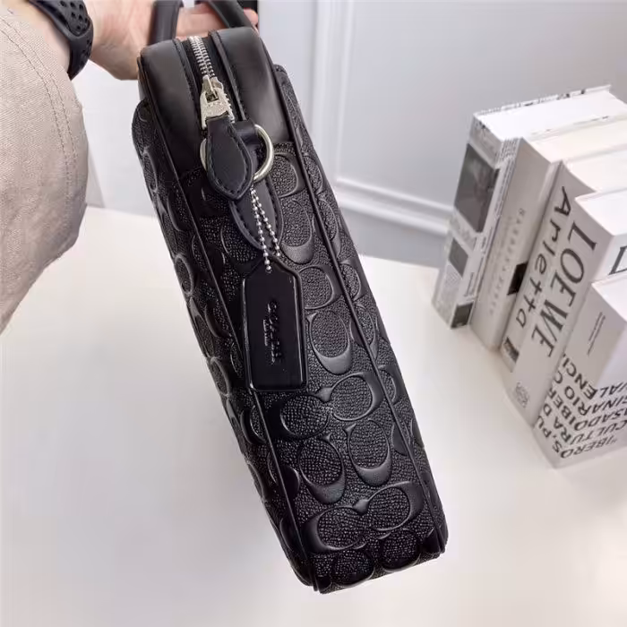 WhatsApp Image 2025-12-18 at 10.25.52 PM (2) Coach Embossed Premium Laptop Bag