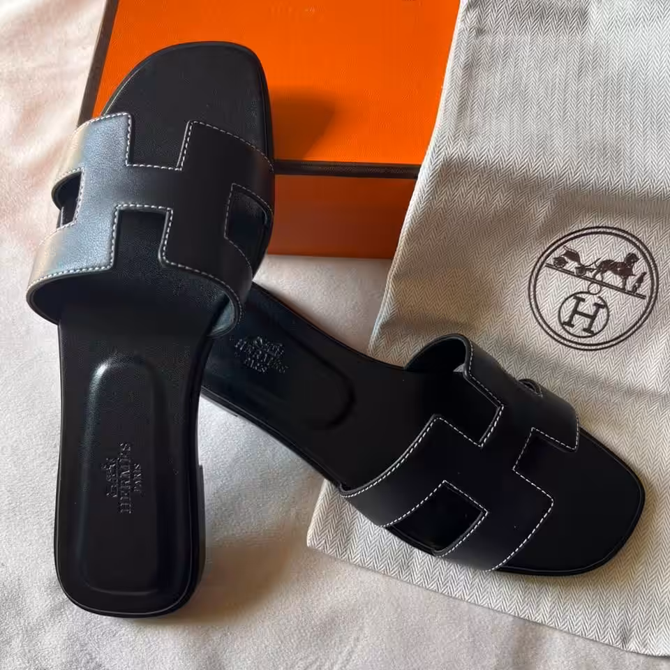WhatsApp Image 2026-01-05 at 10.59.47 PM Hermes Oran Black Flat Sandal